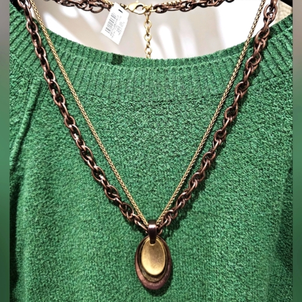Chicos Art Deco multi-strand design with mixed metal tones and a layered pendant